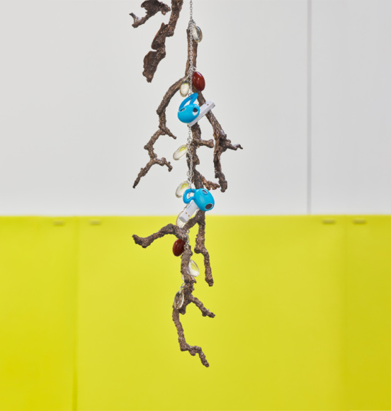 Optimal Functioning (I, detail image) bronze, steel, PU, vitamin capsules, earbuds, sound, silicon, salt (2024). Courtesy of Reinis Lismanis, No Show Space and Commonage London